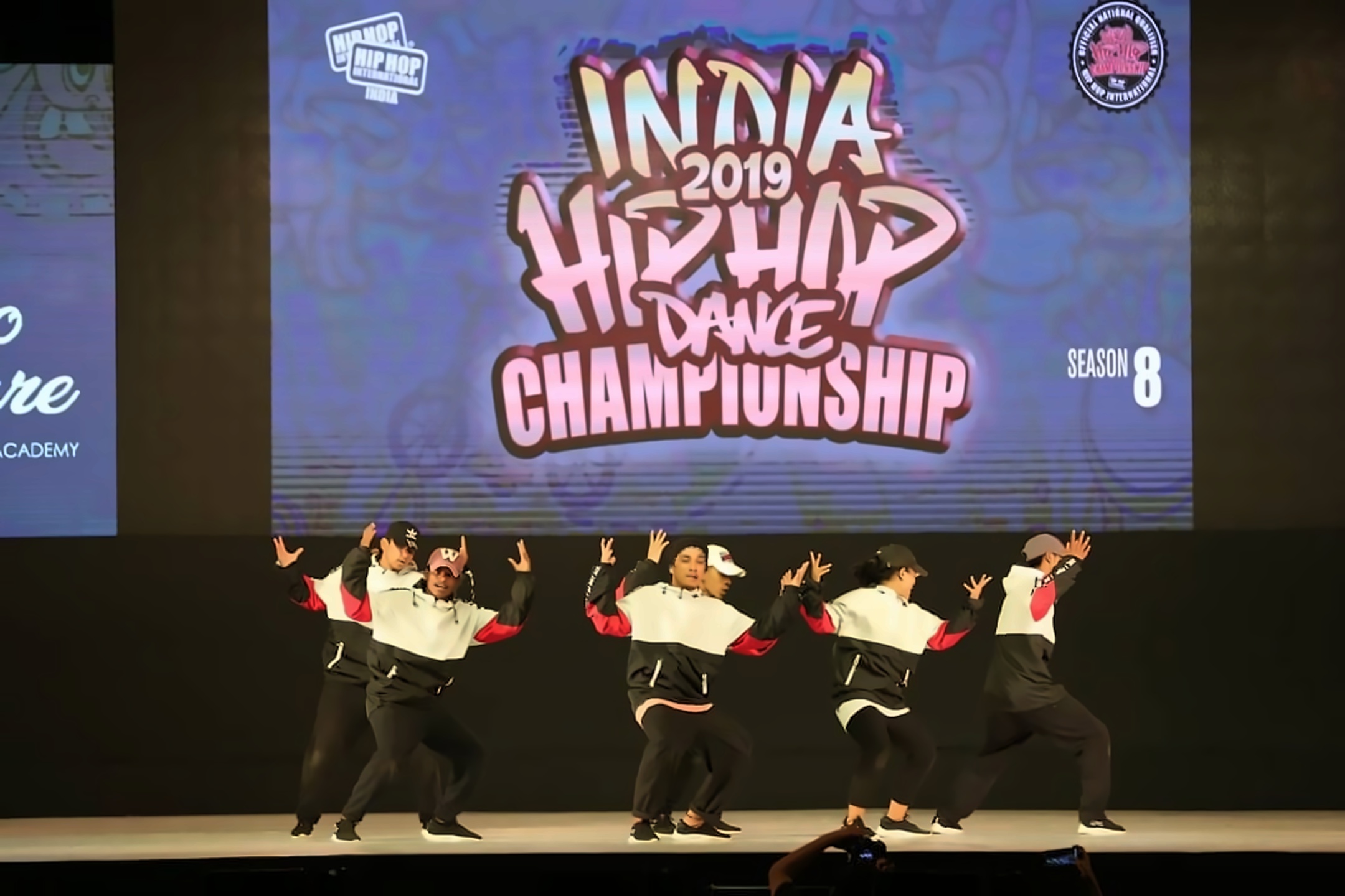 Hip Hop Dance Crew Performing a Synchronized Routine on Stage at India Hip Hop Dance Championship 2019