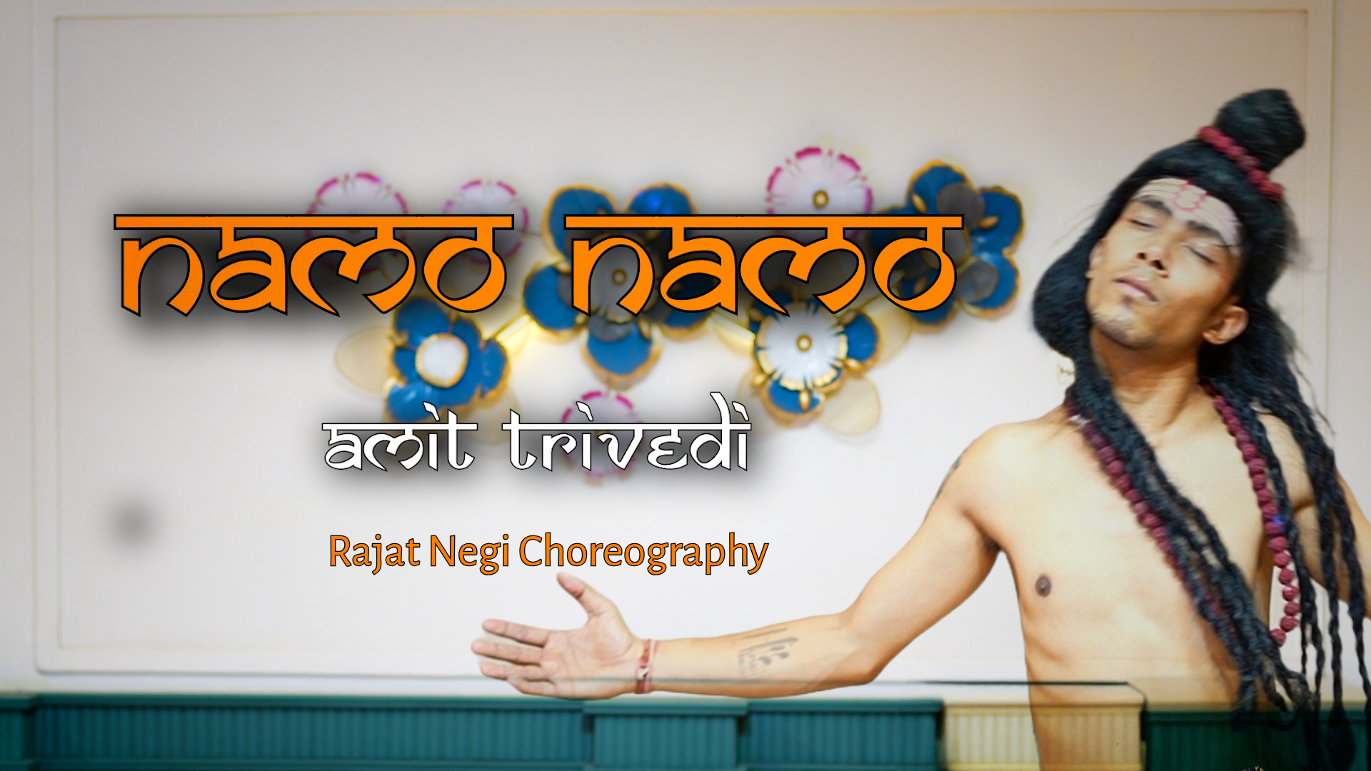 Rajat Negi performing a Shiva-inspired dance on "Namo Namo" by Amit Trivedi, with divine expression and symbolic costume.